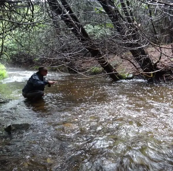 One of my clients staying low and quiet on a small stream