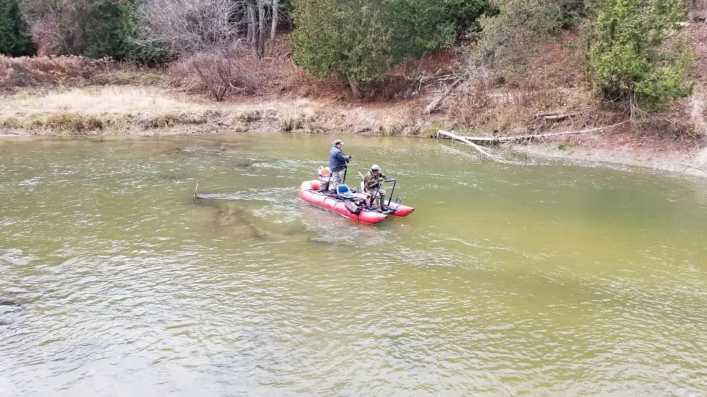 Anglers fishing on a medium size steelhead river