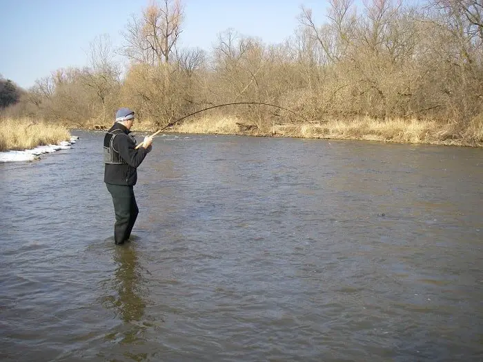 Centerpin fishing and Float Fishing - An anglr fishing a big fish on a Centerpin rod.