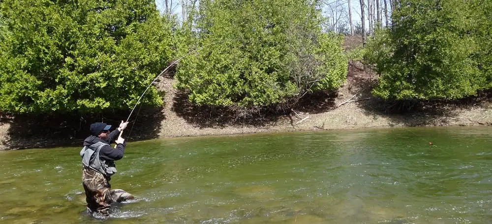 A Centerpin angler hooking into another nice steelhead