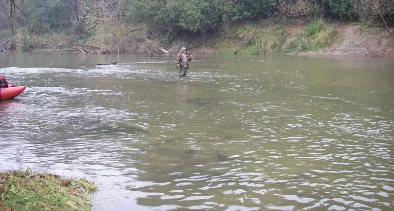 Float fishing for trout after rain