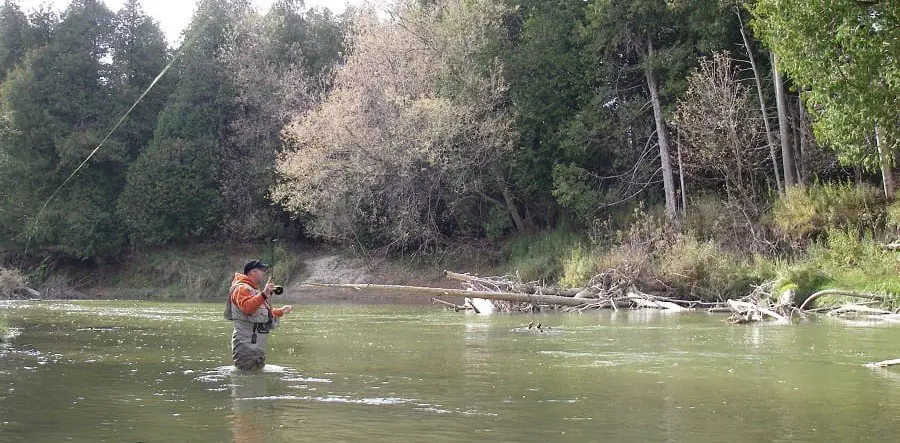 An angler standing in the wader in a good pair of steelhead waders