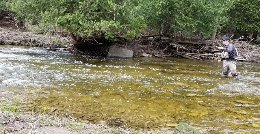 An angler French Nymphing straight upstream