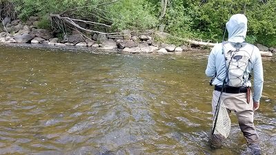 An angler float Fishing with flies