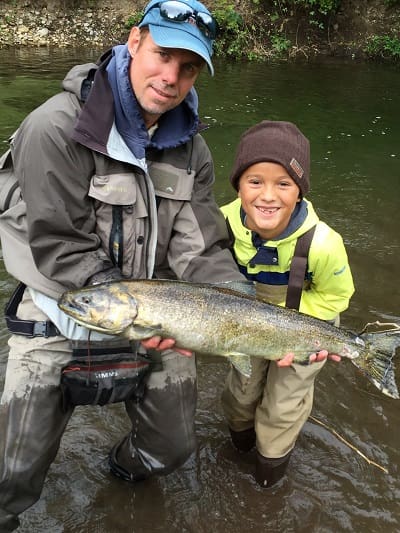 A young client with his first salmon