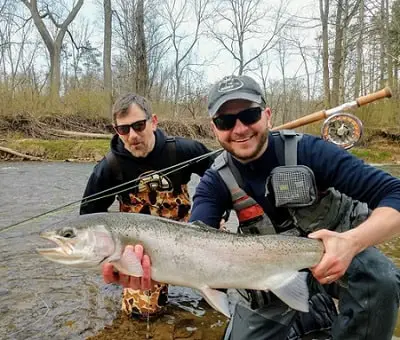 Alley Grabs clients with a nice Chagrin River Steelhead