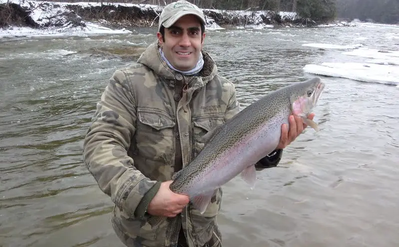 An angler with a nice winter Steelhead 