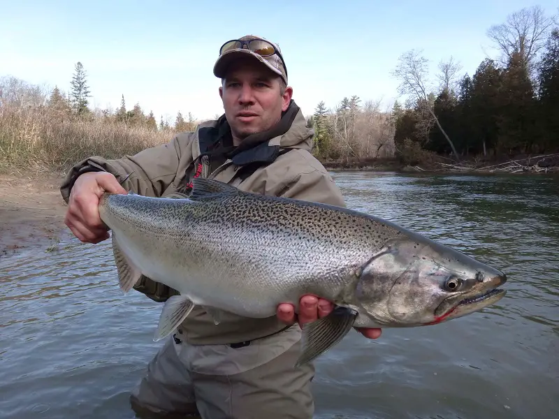 One of my guide buddies with a late fall salmon caught while centerpin fishing for salmon