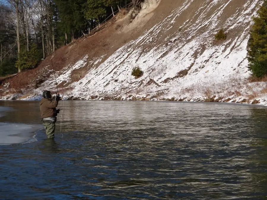 An angler winter spey fishing for steelhead