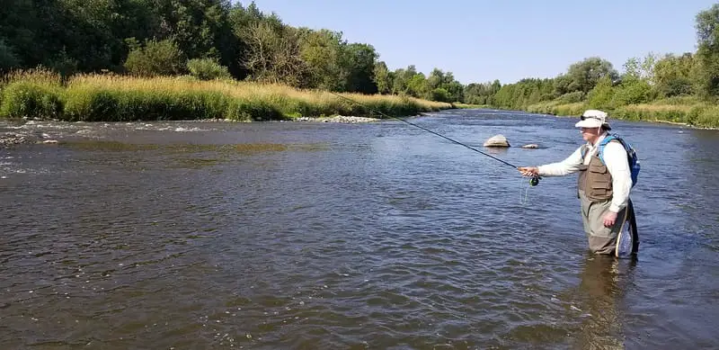 A new fly angler wearing all the right gear