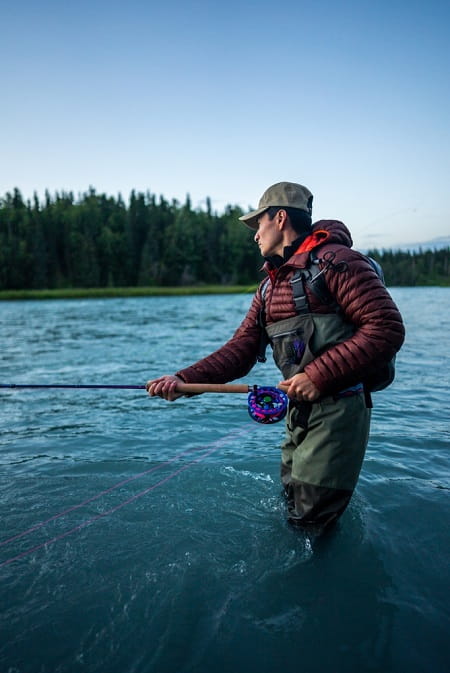 An angler fishing with all the the right size gear For Alaska Salmon Fishing