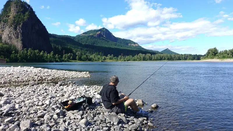 A man fishing the Columbia River near Beacon Rock State Park, Washington