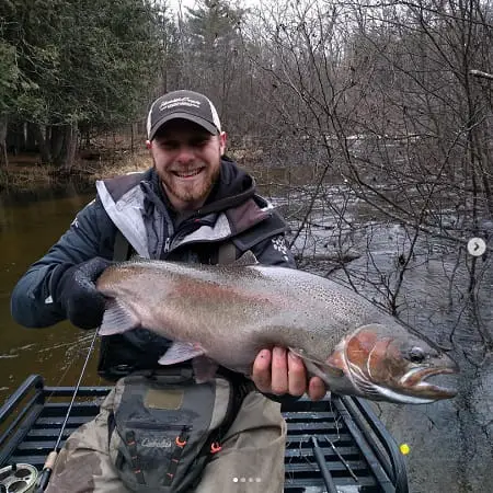 Alex with a December Michigan steelhead