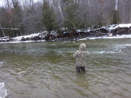 A clients fighting a big steelhead using the right floats and weights setup