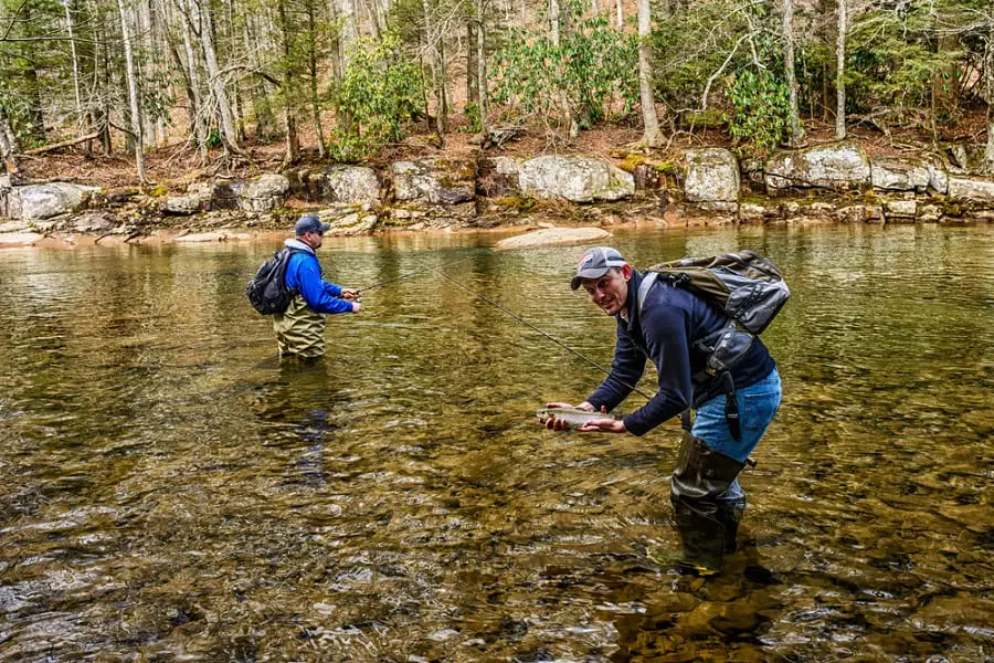 2 anglers Fly fishing Virginia on a clear mountain stream