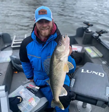 Alex from Fire Plug Charters with a nice Walleye