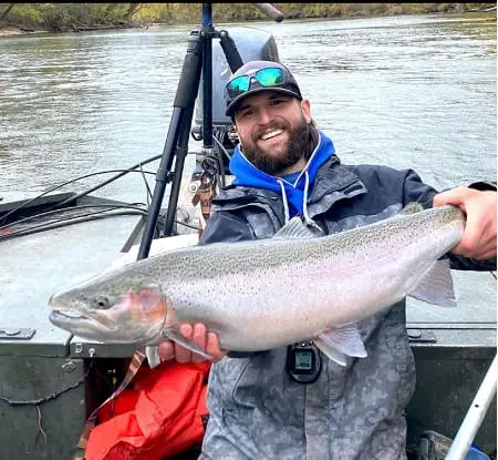 John from Get Bent Guide Service with a big fall steelhead