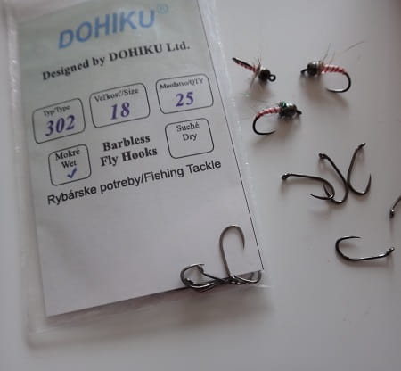 Dohiku fly tying hooks and some tied flies.