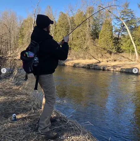 An angler river fishing