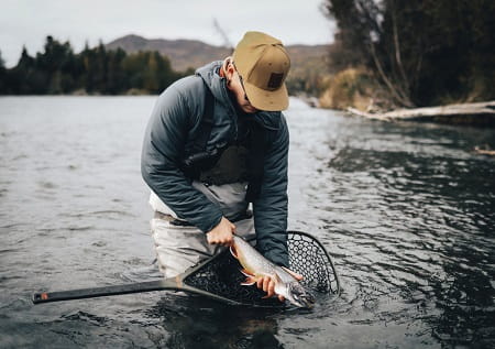 A nice brook trout in a wading net.