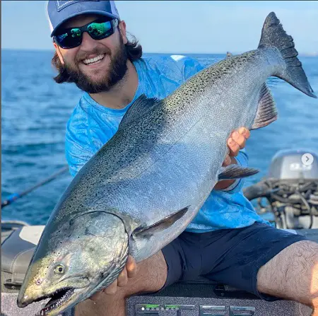 John from Get Bent Guide Service in Michigan With a Lake Michigan Salmon
