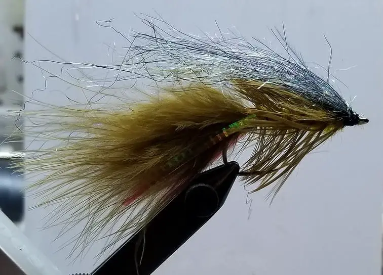 This articulated streamer with a greenish flash back is one of my best streamers for trout.