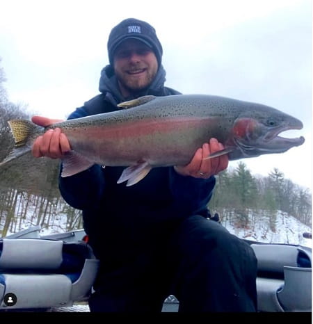 Alex from Fire Plug Charters with a nice steelhead caught on one of his steelhead fishing rigs.