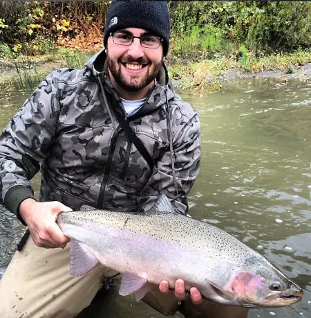 Andrew from Full Fishing Guide Service with a nice steelhead caught near buffalo