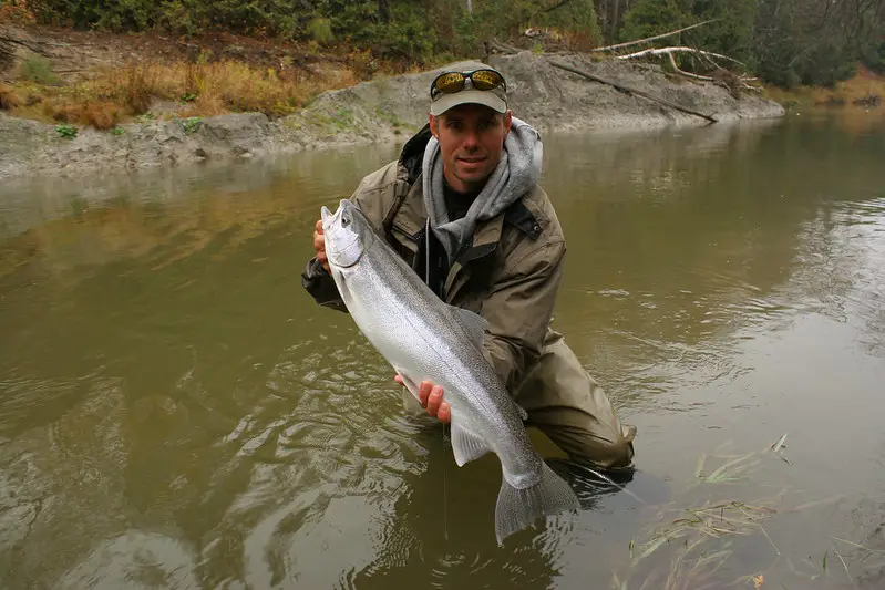 Graham with a fresh run steelhead caught on a click and pawl fly reel