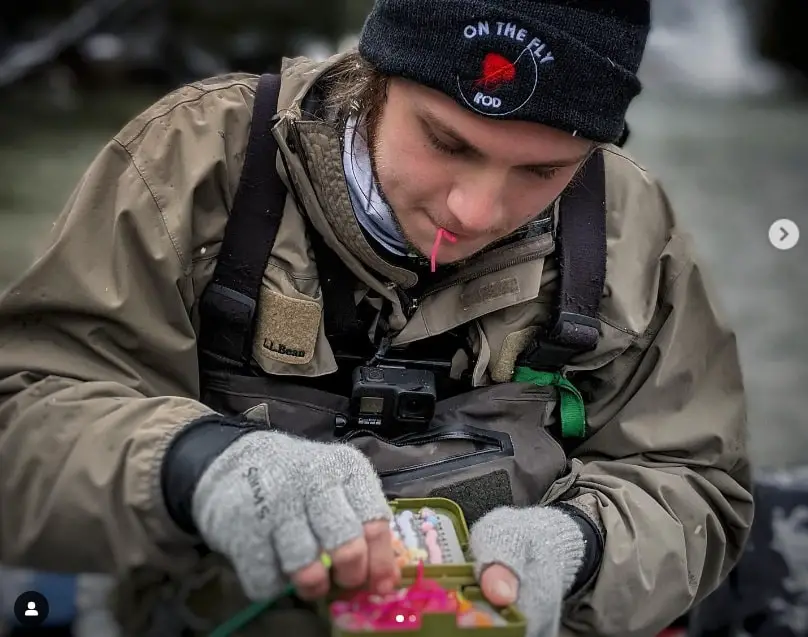 Guide Jordan from A Perfect Drift Guide Company wearing Simms Fingerless wool gloves which are one of the best fishing gloves used by guides.
