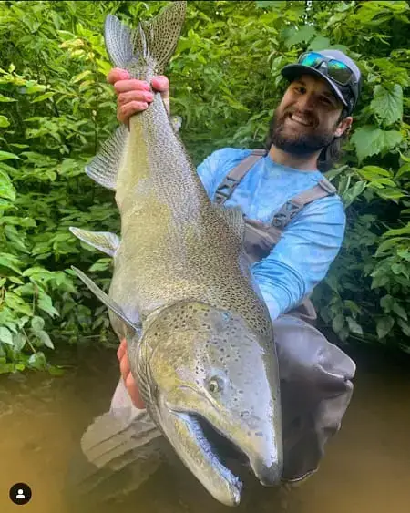 https://troutandsteelhead.net/wp-content/uploads/2023/08/Massive-salmon-held-by-Joh-at-Get-Bent-Guide-Service-SBS-Outdoors-450x-min.jpg?ezimgfmt=ng%3Awebp%2Fngcb44%2Frs%3Adevice%2Frscb44-2