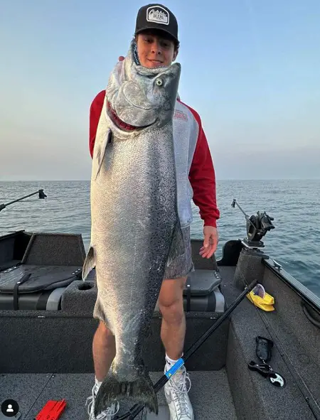 Matthew with a big Chinook Salmon caught trolling in Wisconsin.