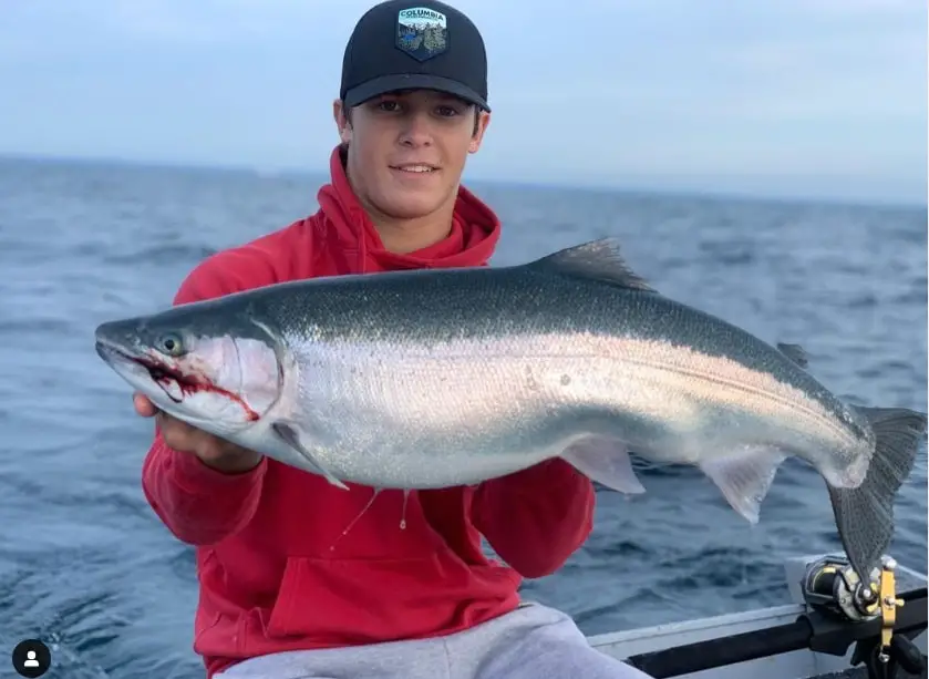 Salmon fishing in Illinois can be good for big salmon like this king salmon caught our photographer Matthew.