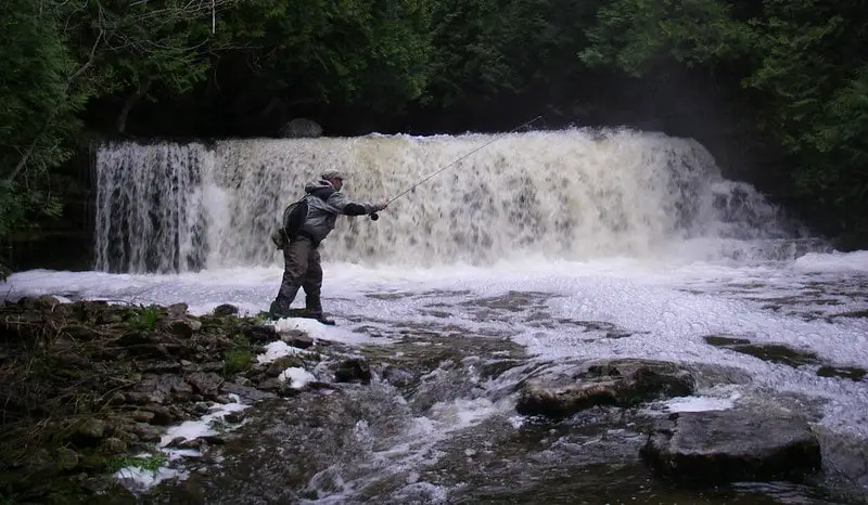 Guide Graham nymphing below a waterfall.