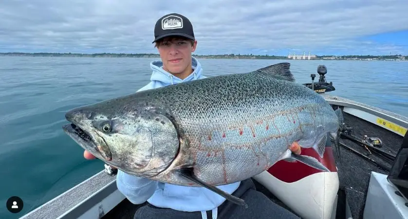 Salmon fishing in Illinois consists of a lot of lake fishing on Lake Michigan for huge salmon like this one. 