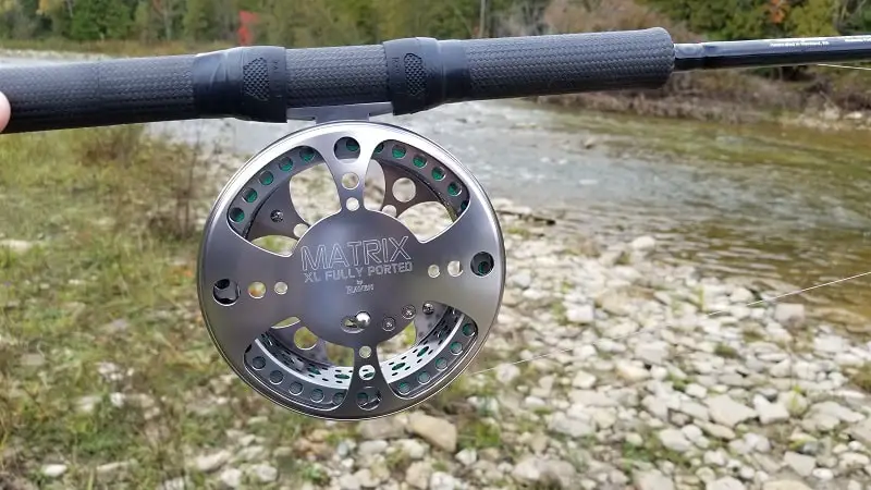 Raven Matrix Centerpin Reel. When comparing the Raven Matrix Centerpin vs fly reel you can clearly see the size difference.