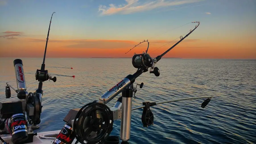 Downrigger trolling rods for salmon rigged and waiting.