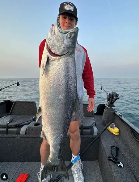 Matthew with a salmon caught using one of our recommended best downriggers.