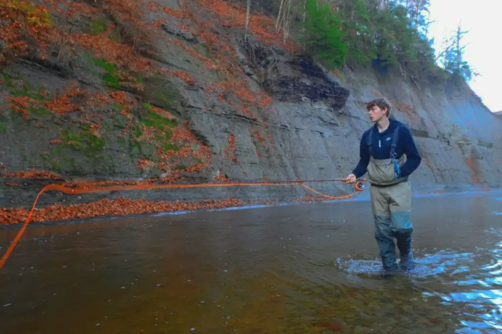 Local Pennsylvania steelhead guide fishing a Clay bank in the fall.