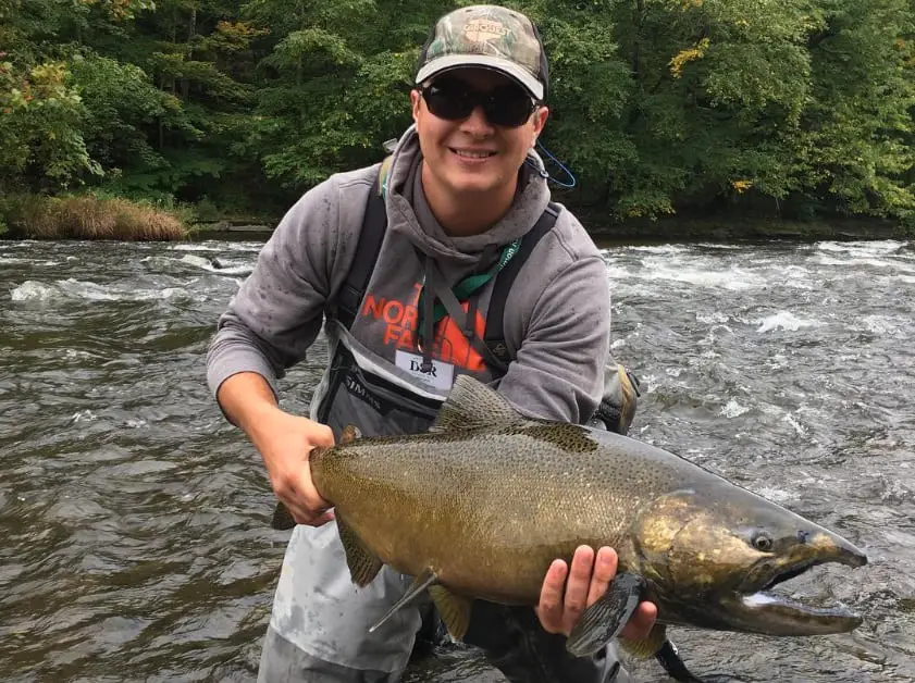 This is Salmon River guide Michael with a large Chinook salmon. Salmon fishing on the Salmon river can be even better if you hire a guide.