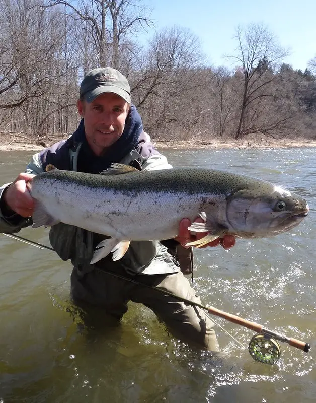 Guide Graham with a nice steelhead caught swinging flies on a Great Lakes river.